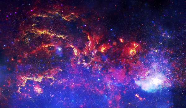 A galaxy's core, painted in deep blue and red