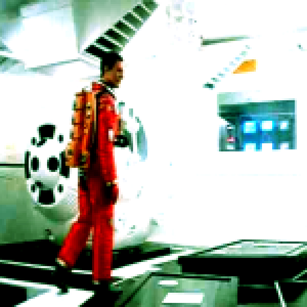 Bowman enters the space capsule