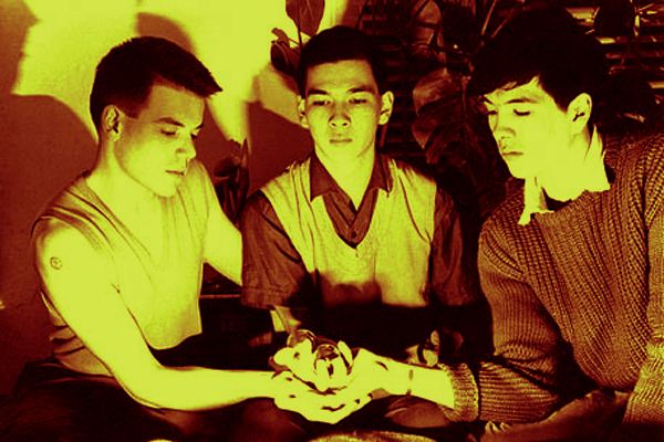 23 Skidoo cradling a mysterious object
