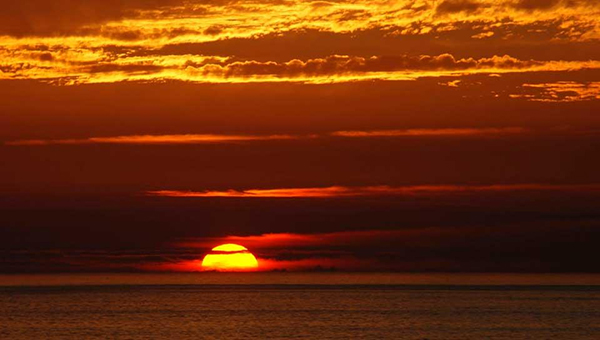 A sunset in deep red and orange.
